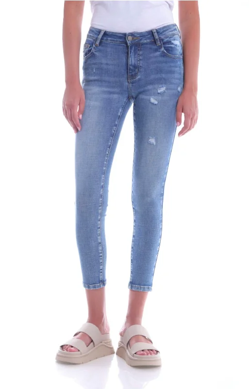 Ariella Mid Rise Distressed Skinny Jean In Light Wash