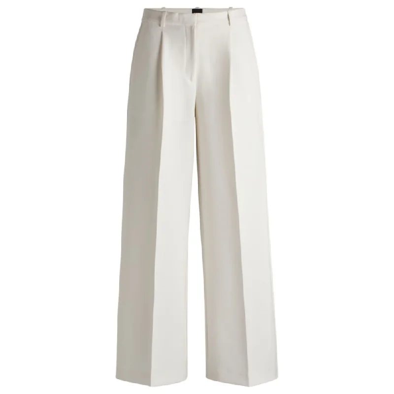 Boot-leg trousers in stretch fabric